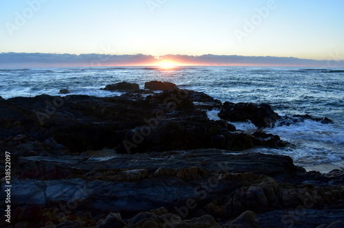Calm peaceful sea and beach on tropical sunrise. A beautiful january sunrise in Australia.