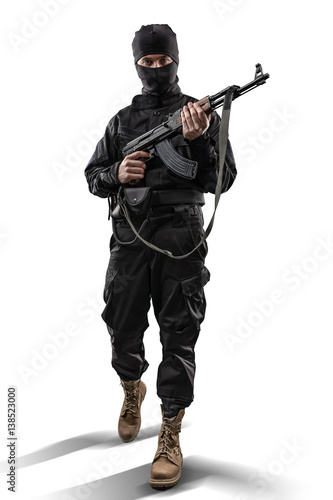 Фотография Soldier with assault rifle isolated