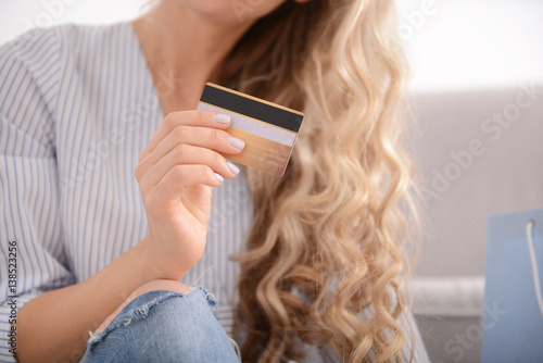 Young woman with credit card. Shopping online concept