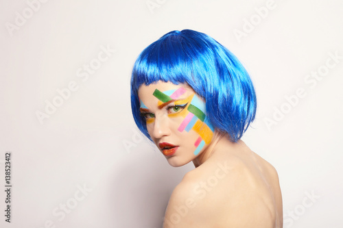 Portrait of young woman wit...