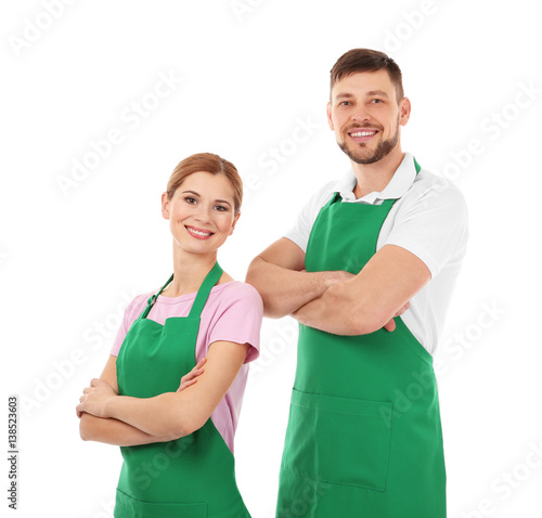Young man and woman in gree...