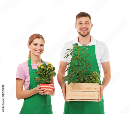 Two florists holding house ...