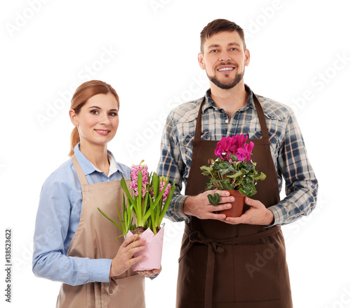 Two florists holding house ...