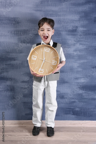 Cute little boy with big cl...