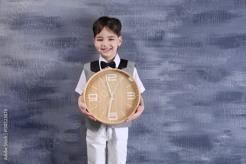 Cute little boy with big cl...