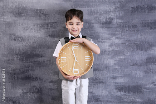Cute little boy with big cl...