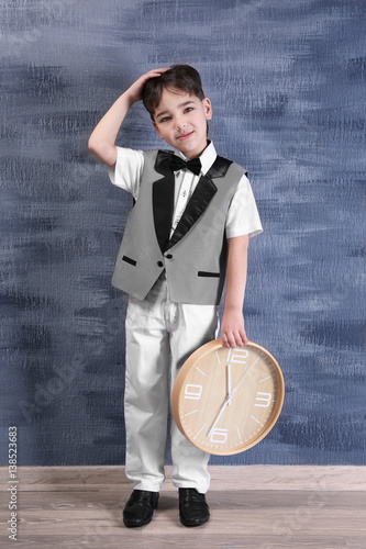 Cute little boy with big cl...