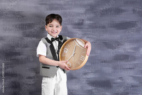 Cute little boy with big cl...