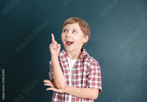 Cute little boy with index ...
