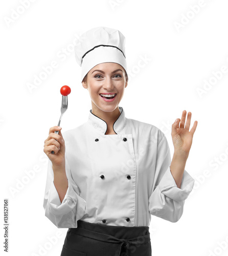 Portrait of female chef hol...