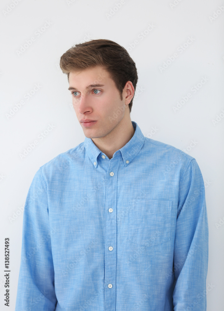 Handsome young man on light background Handsome young man on light background