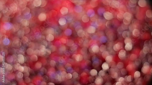 sparkling red and pink abstract blurred background 