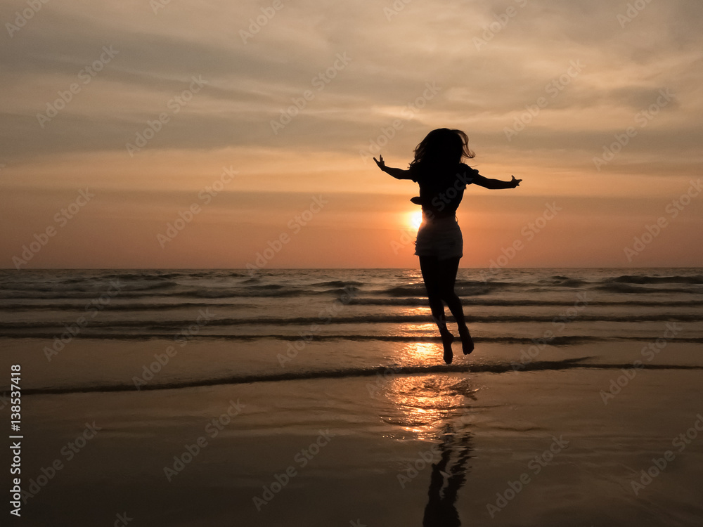 silhouette woman on the beach