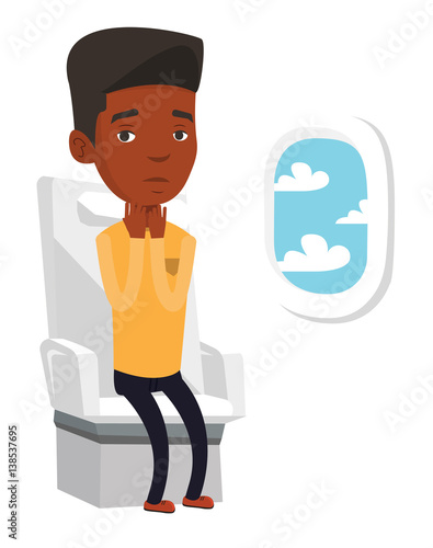 Young man suffering from fear of flying.