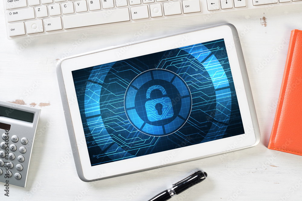 Web security and technology concept with tablet pc on wooden table Web security and technology concept with tablet pc on wooden table