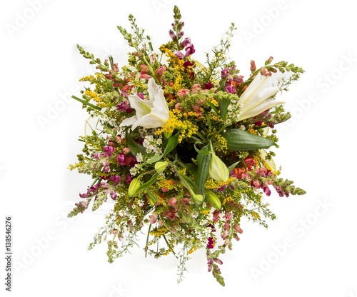 Fototapeta Naklejka Na Ścianę i Meble -  Bouquet of flowers top view on white background