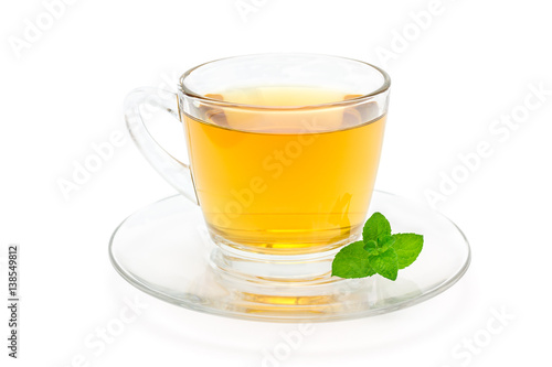 Healthy herbal mint tea in a glass cup isolated on white background, horizontal