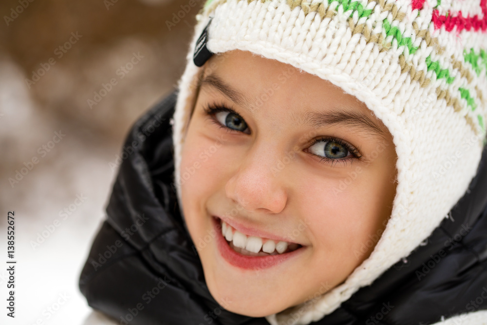 Close up portrait of a cute little girl in winter time Close up portrait of a cute little girl in winter time