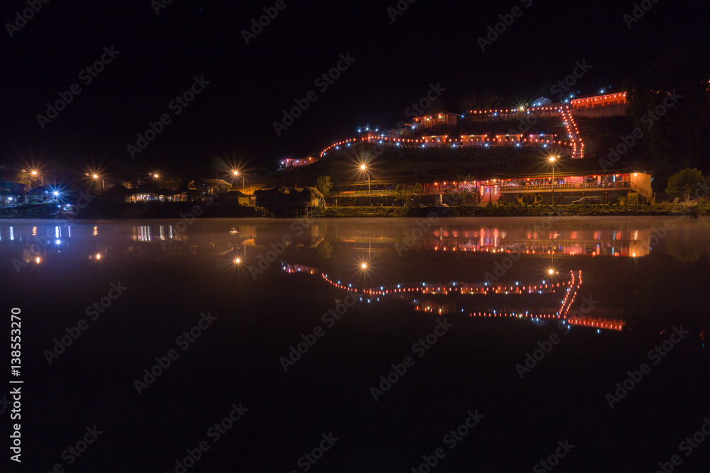 reflection of town in river