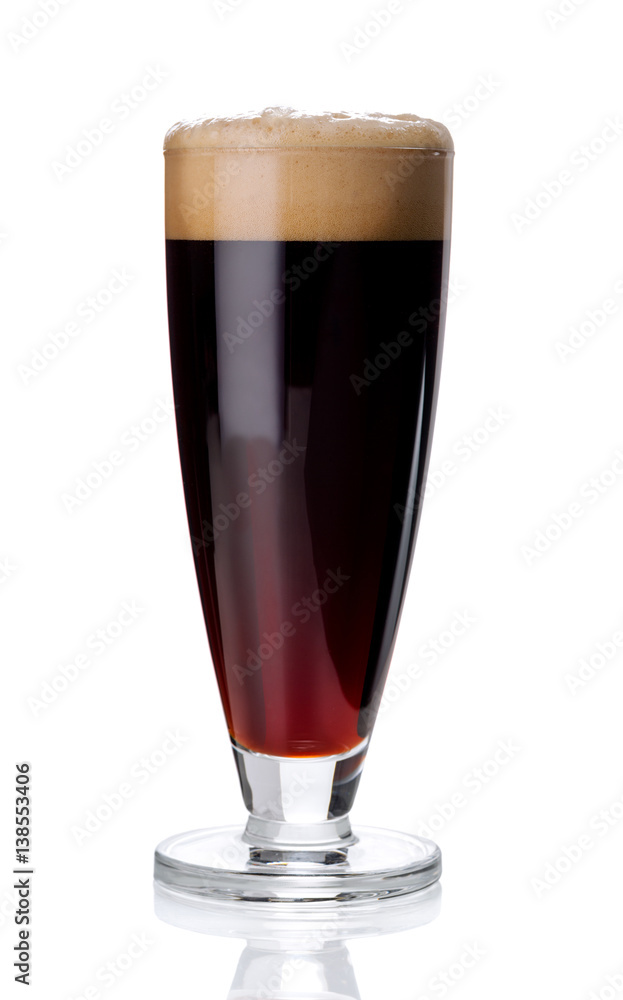Misted glass of red beer on white. Misted glass of red beer on white.