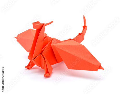 Photo of origami red dragon isolated on white background
