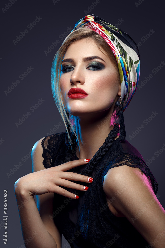 Fototapeta premium Beautiful girl with bright make-up and shawl on head