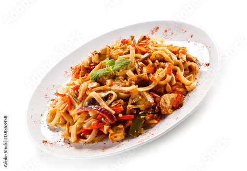 Rice noodles with meat, sauce and vegetables 