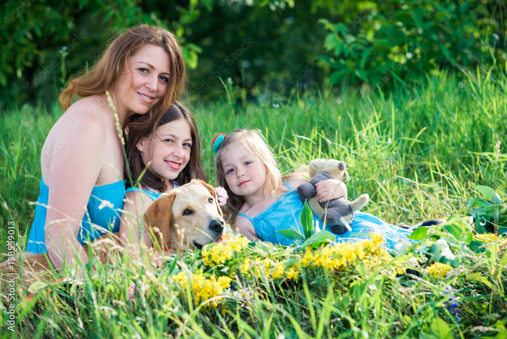 mother, two daughters and dog