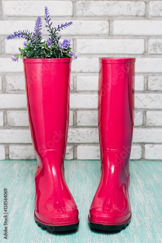 Pink rain boots with spring flowers