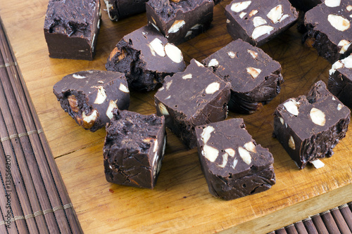 Homemade nut fudge on wood board