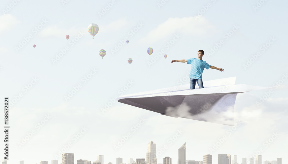 Hipster guy surfing sky . Mixed media Hipster guy surfing sky . Mixed media