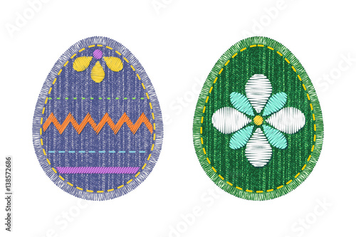 Set of colorful sewing denim patches with stitch and fringe in Easter egg shape. Blue and green jeans fabric with embroidery isolated on white background