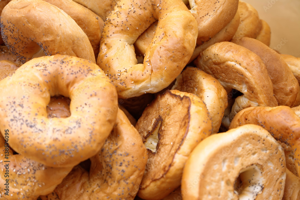 Isolated bagels, cracked in basket.