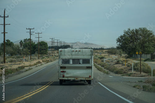 RV Caravan Driving On The Road