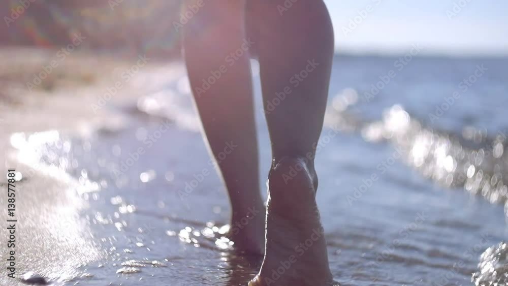 Girl walking on the beach