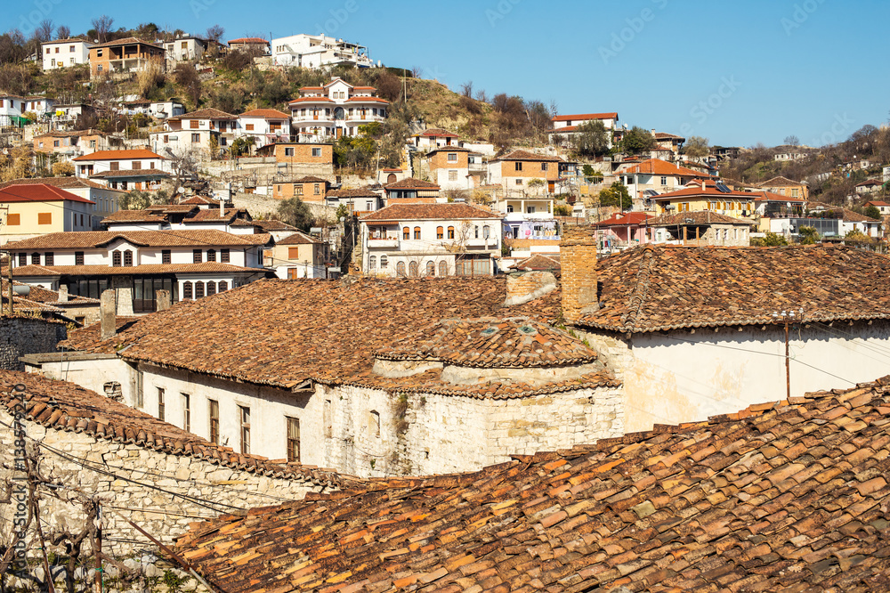 Berat, historical museum town in the south of Albania, captured on a sunny day. Tiny stone streets and white houses built on a hill one over another is the main attraction. 