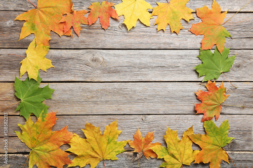 Autumn leafs on grey wooden table