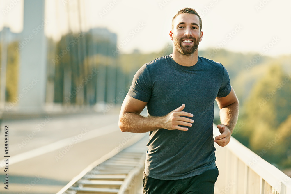 Foto Stock Young Fitness Man Exercising. Living Healthy Lifestyle. | Adobe  Stock
