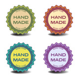 Set of four isolated stickers with the text hand made written on each sticker
