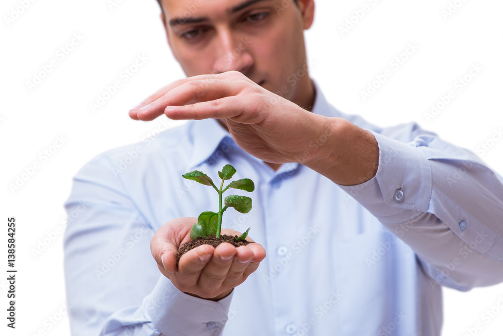 Man holding green seedling isolated on white Man holding green seedling isolated on white