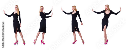 Young girl in black dress pushing isolated on white