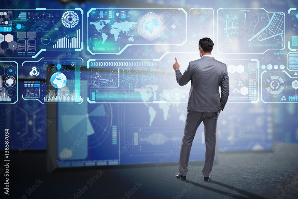 Businessman searching for big data Businessman searching for big data