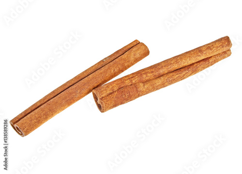 Cinnamon sticks on white background, top view