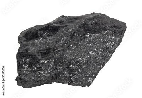Black coal isolated on white background. Black coal is of higher quality than lignite but of poorer quality than anthracite.