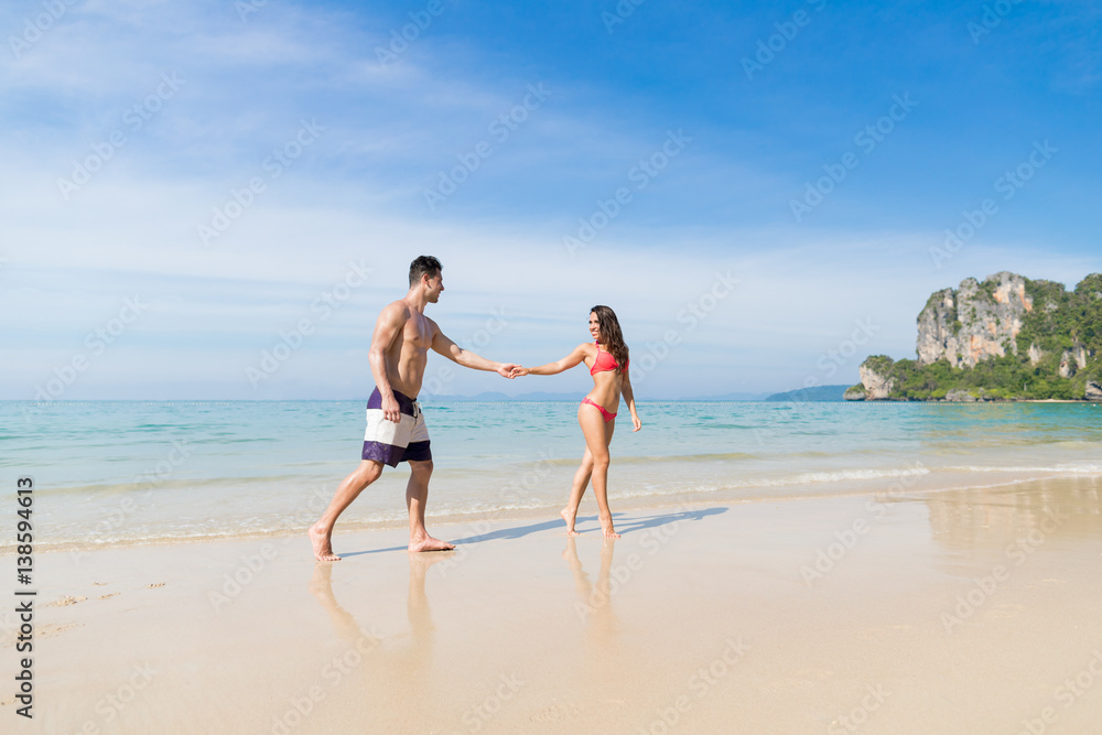 Couple On Beach Summer Vacation, Young People In Love Walking, Man Woman Holding Hands Sea Ocean Holiday Travel