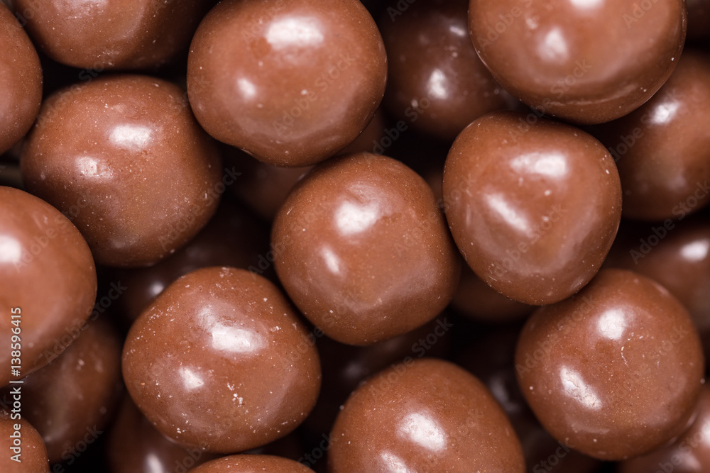 Chocolate round beads marbles sweet cookies macro closeup Chocolate round beads marbles sweet cookies macro closeup