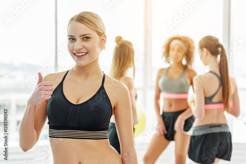 Happy smiling girl in gym