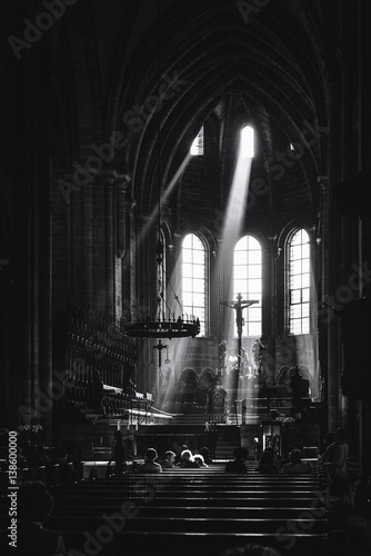 Beams of light shining into Bamberg Cathedral