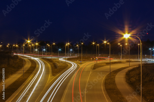 Long exposure of car lights on traffic circle