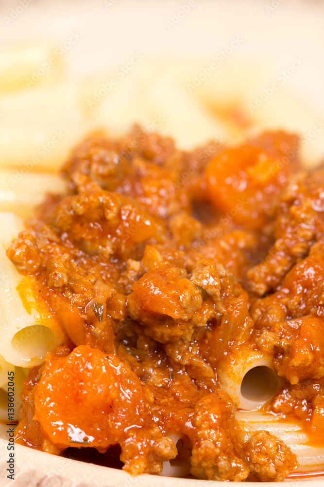 Pork and beef minced meat with tomato sauce and macaroni Pork and beef minced meat with tomato sauce and macaroni